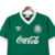 Camisa verde titular do Palmeiras de 1989, com detalhes em branco e logotipo da Adidas e Coca-Cola.