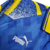 Detalhe da camisa retro azul do Parma Calcio, temporada 1995-96, com logotipo da Puma em destaque.