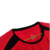 Detalhe do colarinho da camisa vermelha do Manchester United 2002/03 da Nike.