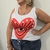 Musculosa -Alanis- estampa Corazón rojo con ojo en internet