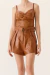 SHORT CLOCHARD SOPHIA CARAMELO CORK na internet