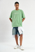 Remera oversize Streetwear en verde, confeccionada en jersey de algodón peinado con estampa en delantero y espalda. Disponible en talles S a XXL