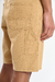 Bermuda carpintera Carpenter en gabardina bull, con botón metálico personalizado y badana de cuero en trasero.