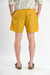 Short de baño liso "Crushed", confeccionado en nylon bomber, con bordado a contratono y cordones jaspeados, disponible en verde, gris, mostaza y negro.