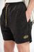 Short de baño liso "Crushed", confeccionado en nylon bomber, con bordado a contratono y cordones jaspeados, disponible en verde, gris, mostaza y negro.