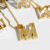 Colar Letras vazadas Shine banhado a Ouro 18k