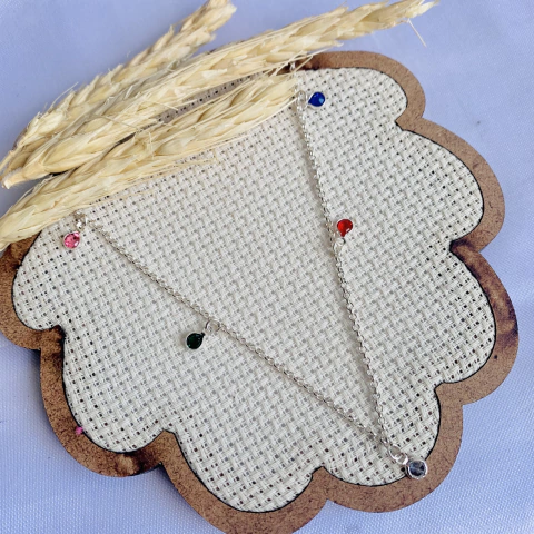 Tornozeleira prata com zircônias coloridas