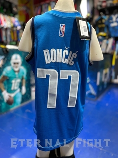 CAMISETA NBA DALLAS MAVERICKS N°77 CELESTE NIÑOS en internet