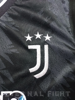 KIT FUTBOL JUVENTUS NEGRO 2023 NIÑO en internet