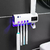 base para cepillos con dispensador de crema dental JX-5588