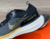 Imagem do Tênis Masculino Nike Zoom X Preto Dourado Esportivo