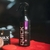 Frasco de 500ml do QuickD Quick Detailer da Dub Boyz ao lado de uma cera em pasta e um aplicador vermelho.