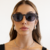 Óculos de Sol Feminino arredondado com Hastes em Cinza - Opala Bicolor - comprar online