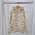 Campera Rompeviento estampado niña