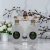 Banho Mensageiro da Paz Líquido 500ml 7 Folhas sobre base de mármore. Banho para Paz, Harmonia e Equilíbrio Espiritual.