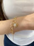Pulseira Ponto de Luz Flor Folheado em Ouro 18K na internet