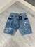 BERMUDA JEANS LACOSTE DESTROYED na internet