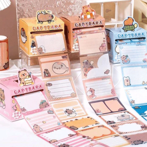 Conjunto de Sticky Notes com adesivos de capivara, contendo 48 unidades em diferentes cores e designs fofos.