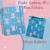 Kit Caderno A5 e Mini Fichário com estampas de gatinhos em fundo azul.