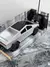 Carrinho de controle remoto Tesla Cybertruck 1:12 rc car recarregável