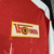 Camisa masculina do Union Berlin, modelo home 24/25, predominantemente vermelha com detalhes brancos para disputa da bundesliga