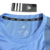 camiseta climalite simbolo lateral azul - loja online