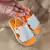 SANDALIA APUANA BABY LARANJA E BRANCO MASCULINO