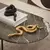 Escultura Serpente em Poliresina Dourado - comprar online