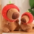 Peluche Capybara Gorro Frutilla 20cm Movimiento