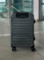 Mala de viagem cinza Travix Cabine com rodas e design moderno.