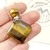 COLLAR PERFUMERO BOTELLA ROMBO DE OJO DE TIGRE - comprar online