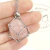 RELICARIO DE ACERO RED CUARZO ROSA - Ser Mineral Accesorios