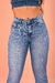 CALÇA FLARE COM PUÍDO BARRA SOLTA