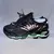 Mizuno Prophecy 8 - PRETO E VERDE - comprar online