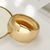 Maxi Bracelete Metal Dourado - Moda Lu Portella | Acessórios Sofisticados | Semijoias de Luxo 