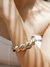 Bracelete Croissant Design Torcido Dourado na internet
