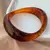 Bracelete Resinado Marron Mesclado Design Orgânico - comprar online