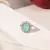 ANEL COM PEDRA OVAL TURMALINA AZUL COM ZIRCÔNIAS BANHO DE RÓDIO BRANCO - Moda Lu Portella | Acessórios Sofisticados | Semijoias de Luxo 