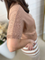 Conjunto Clara com blusa e saia listrada na internet