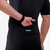 Macaquinho Triathlon masculino da marca Triway, mostrando detalhe do bolso traseiro e design em preto.