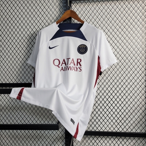 Camisa Paris Saint-Germain Treino 23/24 - Torcedor Nike Masculina - Branca com detalhes em azul e vermelho