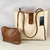 Carteras Tote de mujer en color crema con diseño elegante y neceser marrón incluido.