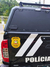 Capota Torden Adventure da Nissan Frontier 2024, instalada no porta-malas de um veículo policial, com emblema da Polícia Civil visível.