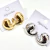 Brinco Pequeno Gota Curvada - Dourado e Prata - comprar online