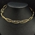 Chocker Aro Enrolada - Dourado e Prata - comprar online