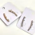Brinco Pequeno Ear Cuff Cravejado - Dourado e Prata - comprar online