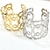 Bracelete de Metal Largo Coração Vazado - Dourado e Prata - comprar online