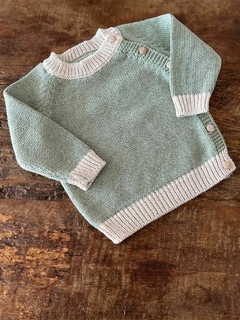 Blusinha Conforto Natu oferece toque macio e fio hipoalergênico para o bebê. Estilo minimalista e sustentável. Compre agora e vista seu pequeno com amor!