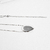 Colar Medalha Oval Maya 60cm Banho Ródio Branco - comprar online