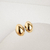 Brinco Maya Oval Liso Banho Ouro 18k - comprar online